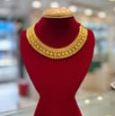Gold jewelry necklace display
